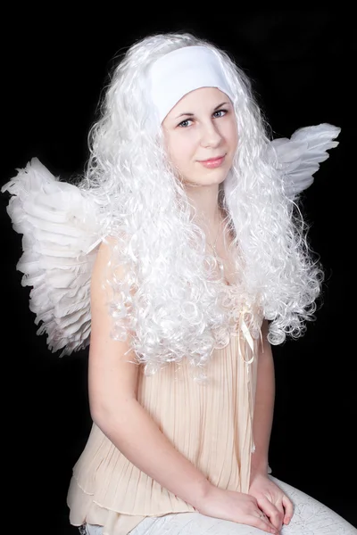 Jemný anděl s dlouhými vlasy — Stock fotografie