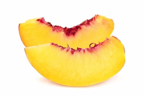Сочные кусочки персика — стоковое фото