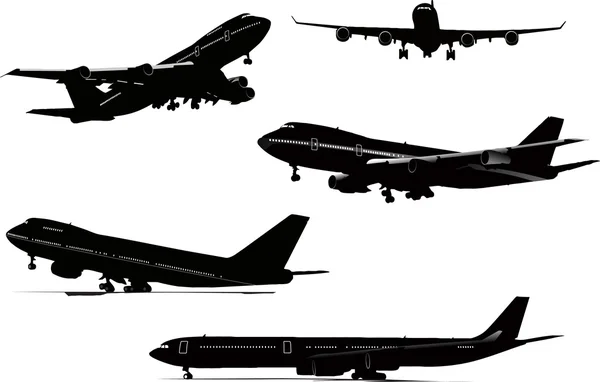 Fünf schwarz-weiße Flugzeug-Silhouetten — Stockvektor