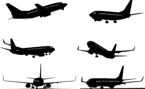 Seis silhuetas de avião em preto e branco — Vetor de Stock