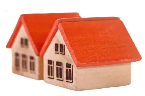 Duas casas de brinquedo de madeira — Fotografia de Stock
