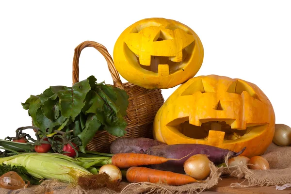 Halloween pumpkin and vegetables — Stock Photo, Image