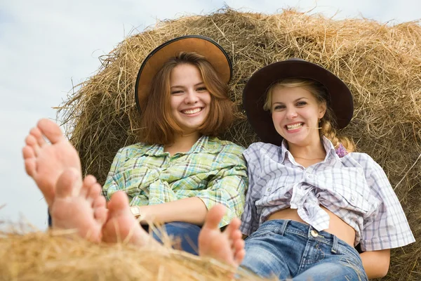 Country girls on hay — Stock Photo, Image