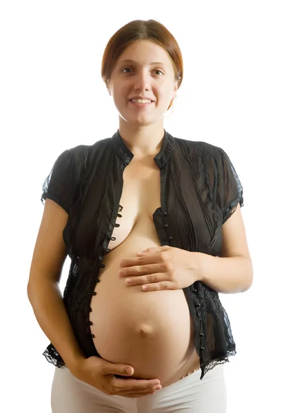 Mulher grávida em camisa preta sobre branco — Fotografia de Stock