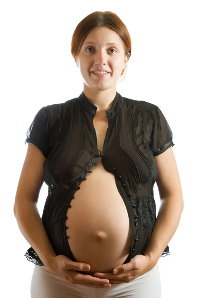 Zwangere vrouw in zwarte shirt over Wit — Stockfoto