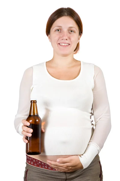 Pregnant woman holding bottle of beer — Stock Photo, Image