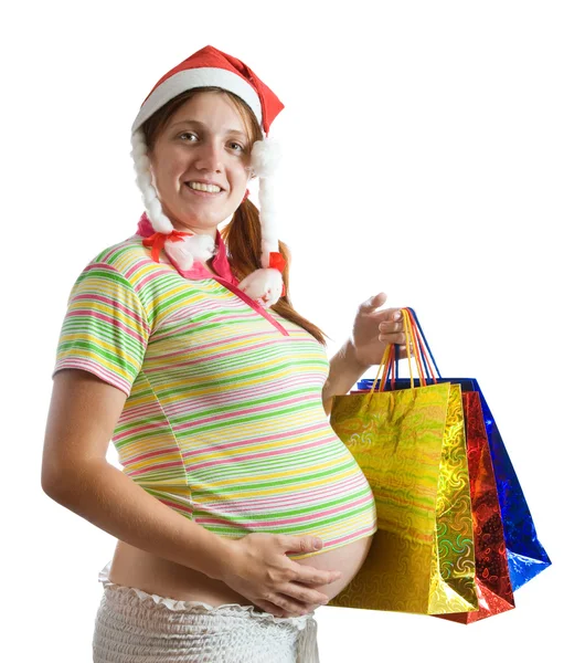 Ciężarna kobieta trzymająca torby na zakupy — Zdjęcie stockowe