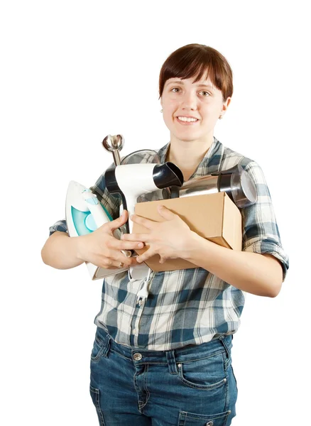 Woman with heavy-handed of household appliances — Stock Photo, Image