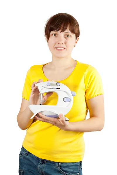 Дівчина з білою швейною машиною — стокове фото