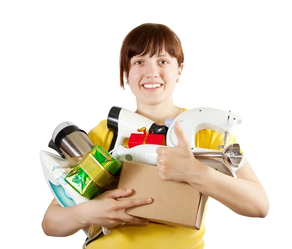 Woman with heavy-handed of household appliances — Stock Photo, Image