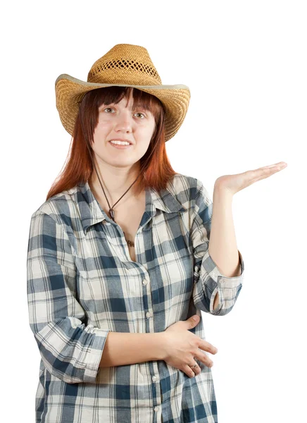 Женщина в клетчатой рубашке указывает рукой — стоковое фото
