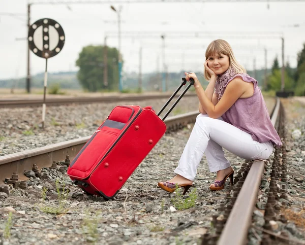 Woman with luggage — Stock Photo, Image