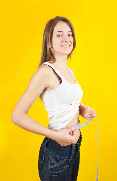 Girl measuring waist — Stock Photo, Image
