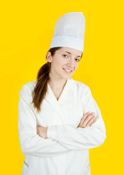 Chica cocinera en toque — Foto de Stock