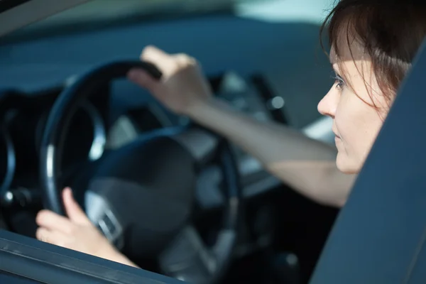 Woman is driving her car — Stock Photo, Image
