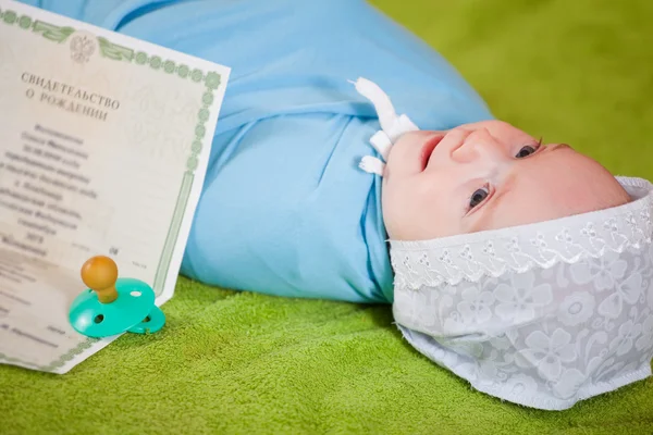 stock image Baby with certificate of birth