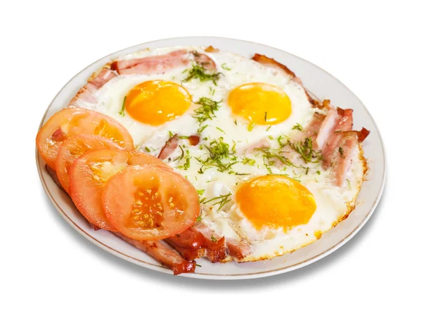 Смажені яйця з беконом на тарілці — стокове фото