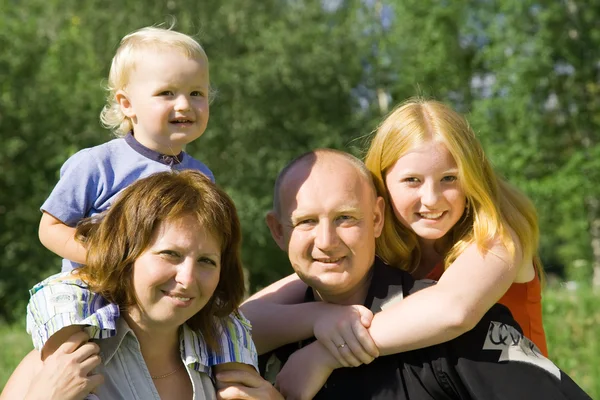 Happy family of four — Stock Photo, Image