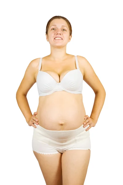 Беременная женщина в акушерском бинде — стоковое фото