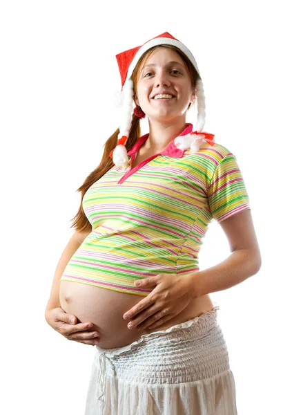 Mulher grávida em santa chapéu — Fotografia de Stock