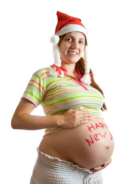 怀孕的女人在圣诞老人帽子 — 图库照片