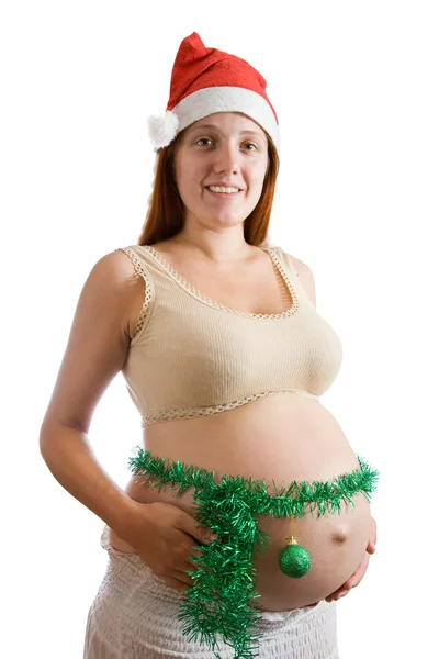 Mulher grávida em santa chapéu — Fotografia de Stock