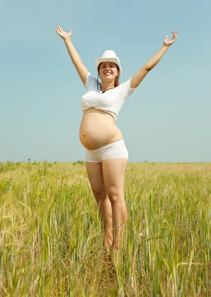 8 months pregnant woman Stock Image