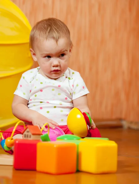Niño de un año con juguetes — Foto de Stock