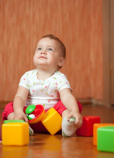 Niño de un año con juguetes — Foto de Stock