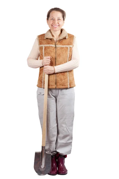 Счастливая зрелая женщина с лопатой — стоковое фото