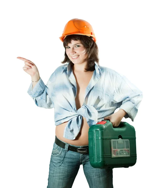 Girl in hard hat pointing away — Stock Photo, Image