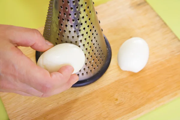 Closeup of grating eggs — Stock Photo, Image