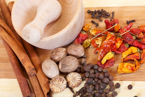 stock image Various natural spiciness with pestle and morta