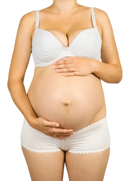 9 个月孕妇的肚子上 — 图库照片