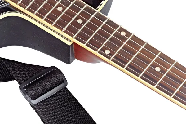 Diapasón de guitarra aislado y un cinturón Fotos de stock