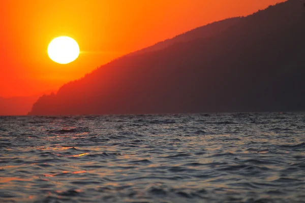 stock image Sunset in the mountains to the sea