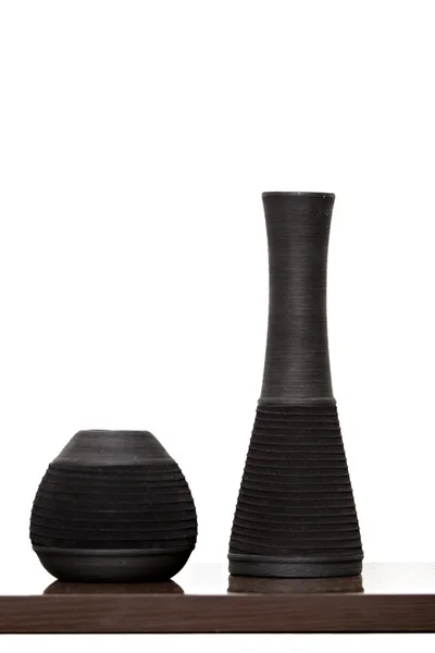 stock image Two black vases isolated on the table