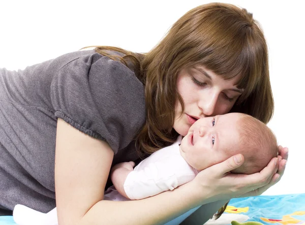 The woman communicates with the baby — Stock Photo, Image
