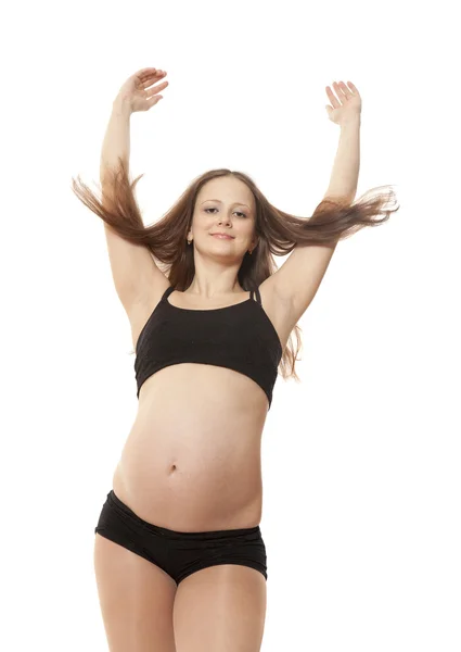 Den unga vackra gravida kvinnan — Stockfoto