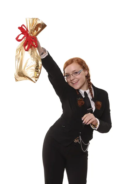 Školačka drží zlatý sáček ovázanou byrokratické — Stock fotografie