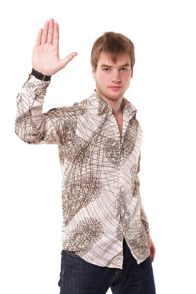 Mladý muž ukazuje zarážku palm — Stock fotografie