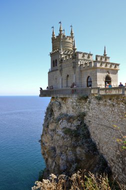 Old castle over the sea clipart