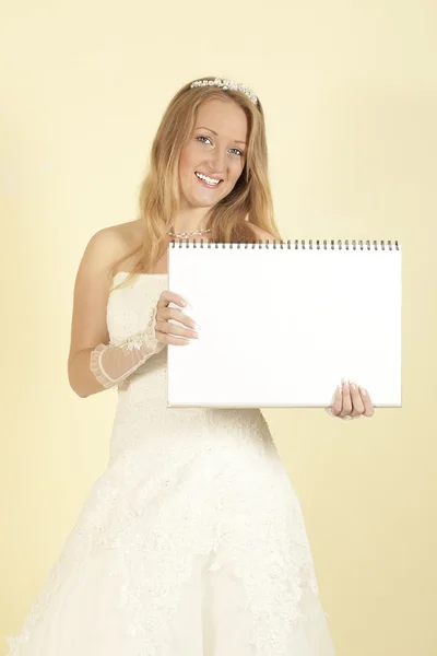 Bride with a placard in the hands of — Stock Photo, Image