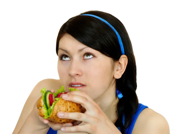 Joven sorprendida mujer con sándwich aislado en blanco — Foto de Stock