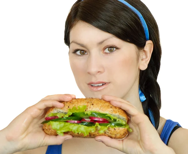 Mujer joven con sándwich — Foto de Stock