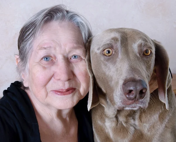 Senior woman and dog — Stock Photo, Image
