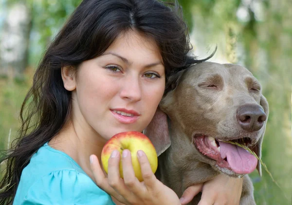 Young woman and dog — Stock Photo, Image