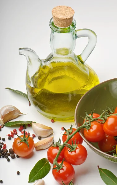 Olive oil and tomatoes — Stock Photo, Image