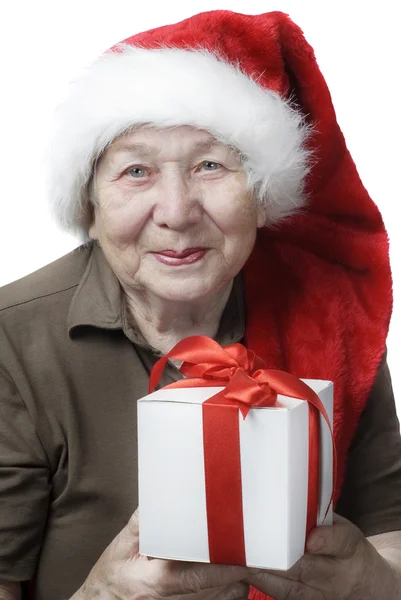 Woman in Santa hat with gift — Stock Photo, Image