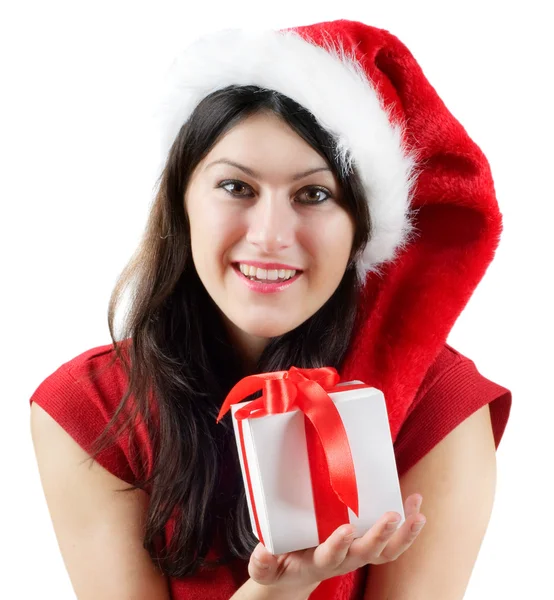 Young woman in Santa hat with gift — Stock Photo, Image